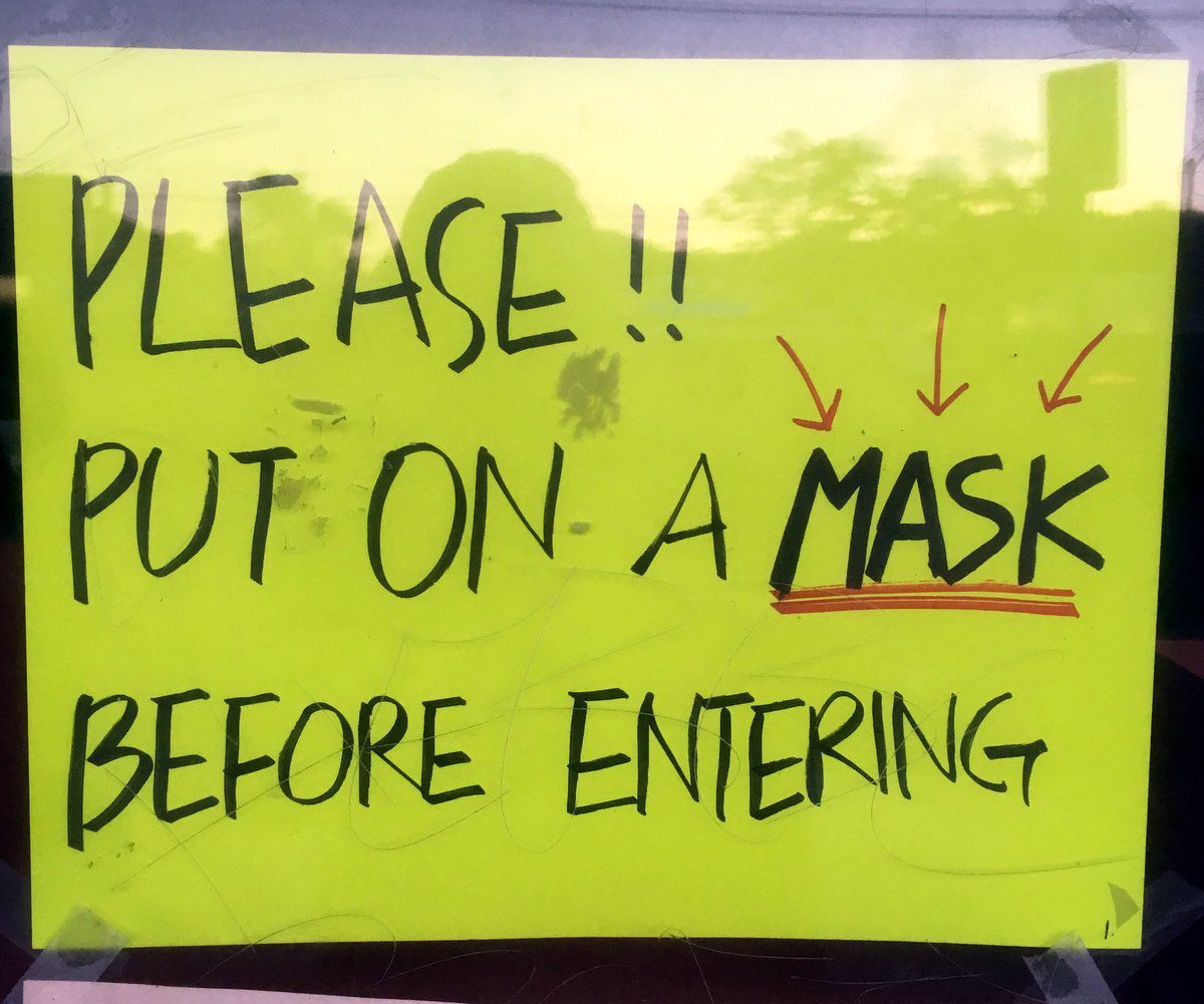 Please put on a face mask coronavirus sign